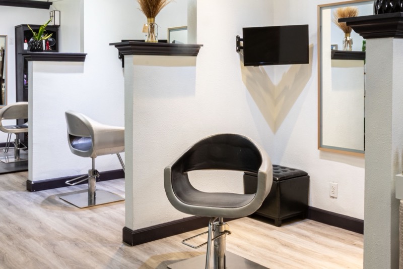 Semi-private booth — stylist chair and mirror